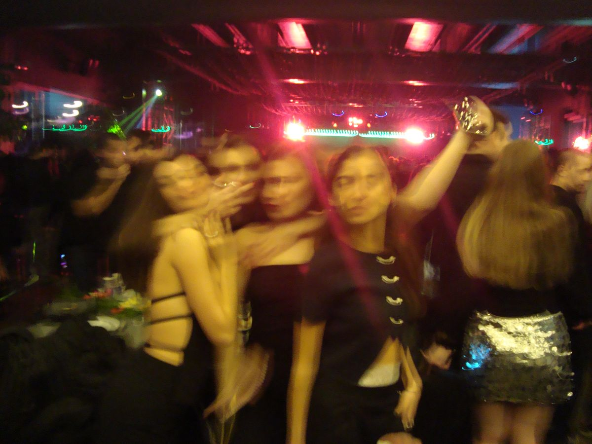 Crowd dancing at a nightclub event